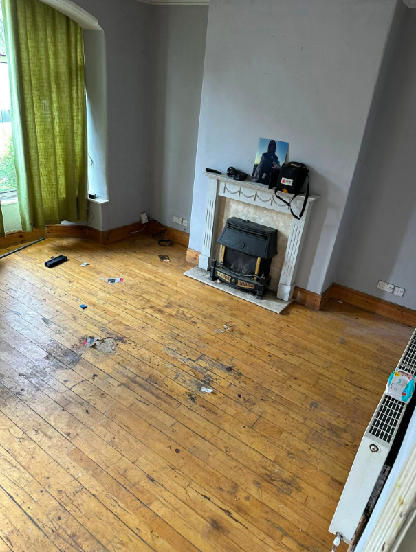 Room left clear after household contents were removed by Vanquish Waste